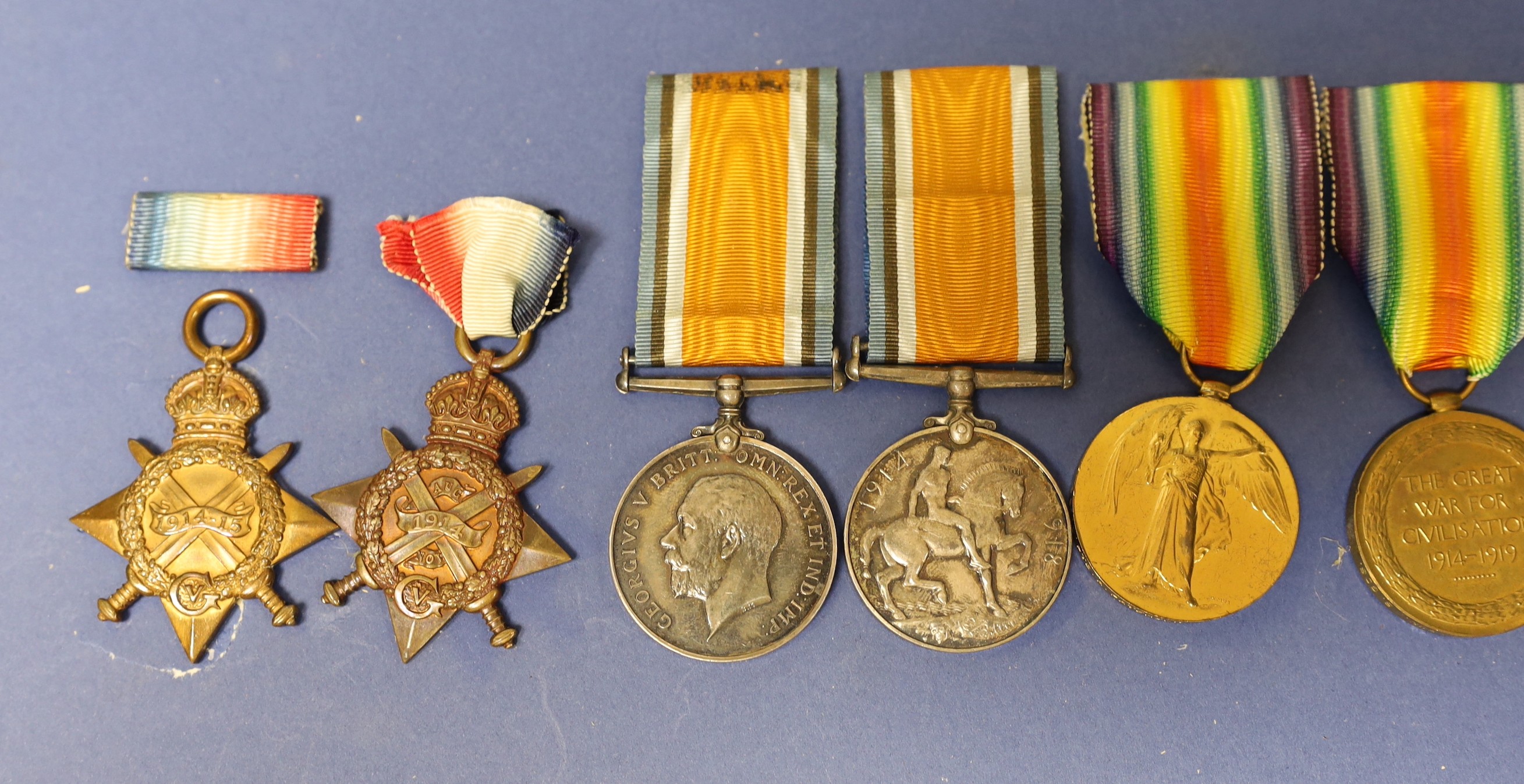 Two WWI family medal trios to 9098 Pte. A Paterson 2/R Scots. including Mons star and to 11619 Pte. A Paterson S. Gds. with miniature medals etc.